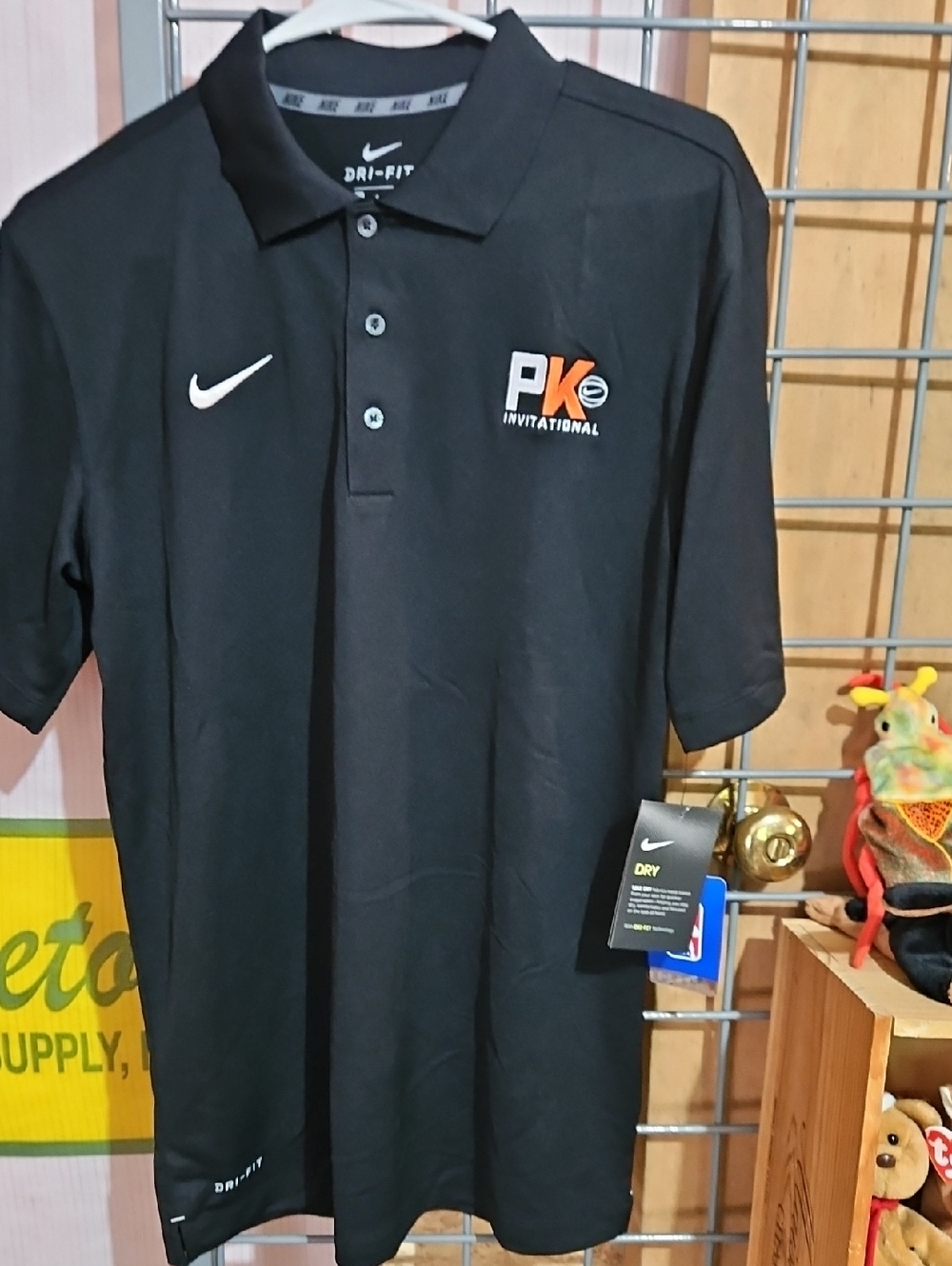 Nike Black PK Invitational Dri-FIT Polo with White Swoosh and Orange Accent
